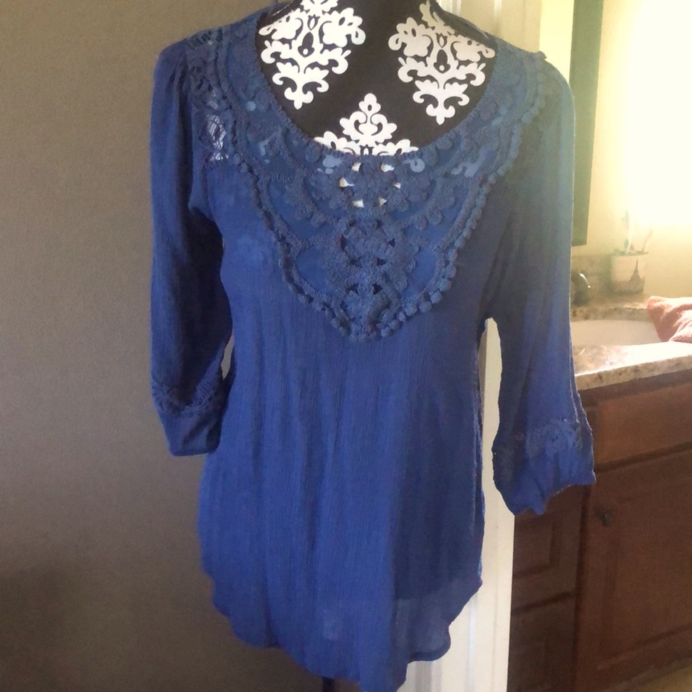 Blue embroidery tunic it runs small equivalent to a Small